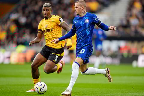 Premier League 2024-25: Wolverhampton Wanderers' Mario Lemina, left, and Chelsea's Mykhaylo Mudryk battle for the ball